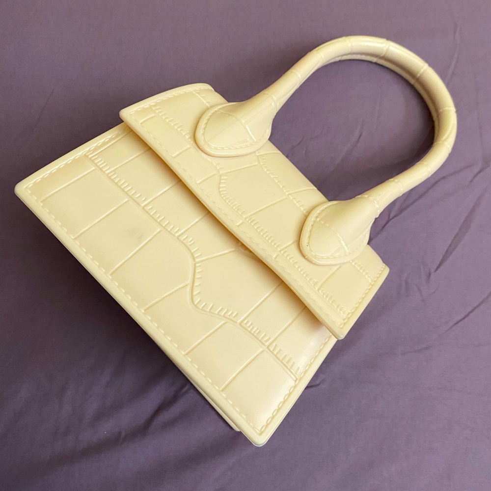 White small hand purse